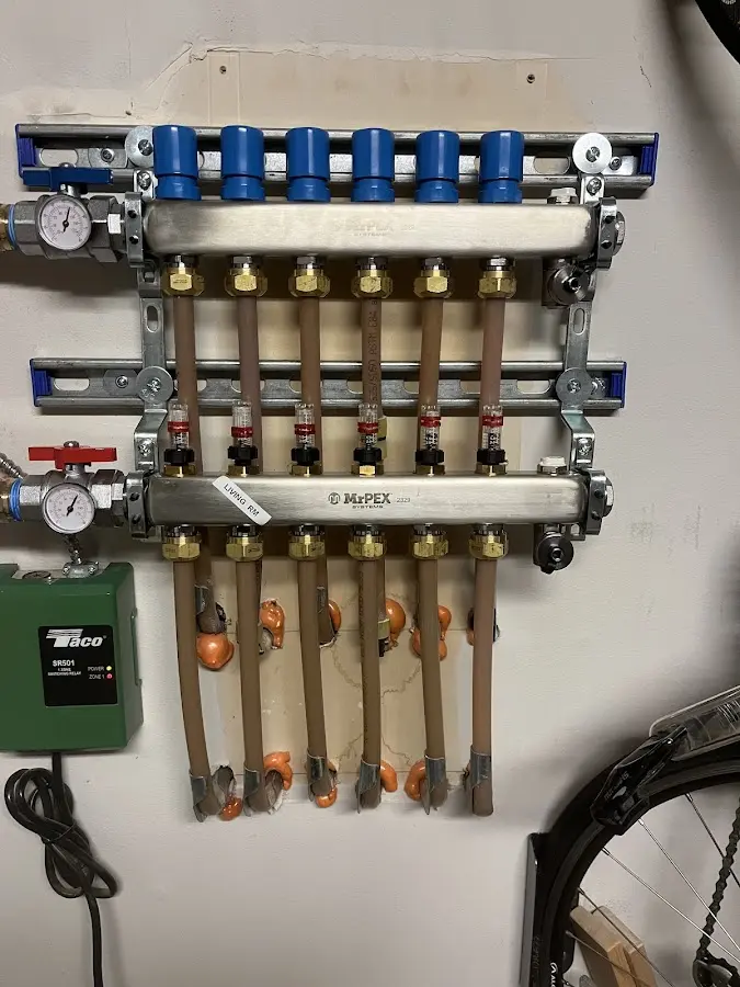 Plumber performing Water Heater Repair at a residential property in Nassau Bay